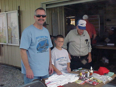 Bob Cole & Son and Jerry Riley view Pilot prizes