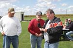 L-R Gene Wilson wins 50- 50 draw, Tom Daily, Jon Fish